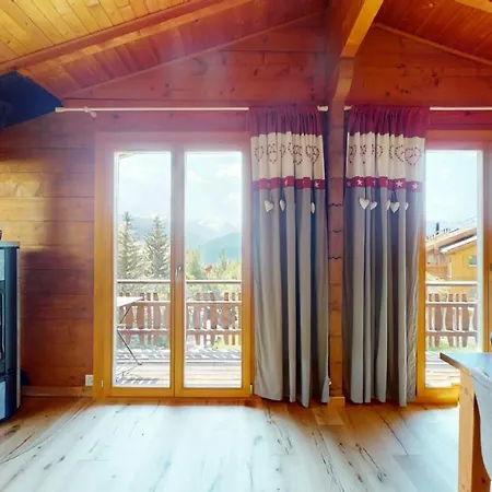 With Spectacular View Of The Peaks